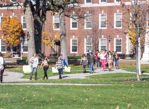 Students outside Asbury Hall in the fall.