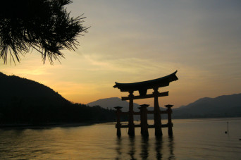 shrine by the sea in the sunset