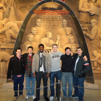 Jimmy Kirkpatrick, Sam Leist, Ronnie Kennedy, Mickey Terlep, Matt Piggins, and Robert McMurray (left to right) visit the Arch before rounds at the Pi Kappa Delta National Tournament in St. Louis (2013).