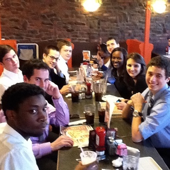 The DePauw Debate team chills after rounds at the 2012 BGSU tournament.  Robert McMurray received the honorary "Big Boy" trophy.