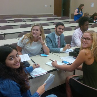 The DePauw Debate Team prepares for the next round at the "Forensic 500" Tournament hosted by the University of Indianapolis. Pictured (left to right): Malak Daher, Jessica Miller, Adam Karadsheh, KeVeon White, Megan Ozog (2016).