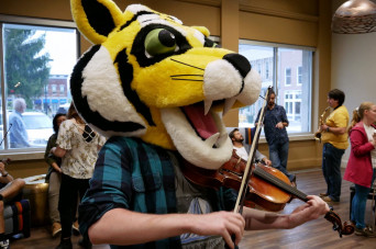 Tyler the Tiger playing the violin