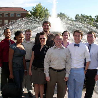 DePauw Debaters enjoy the annual fountain ritual at the "Boilermaker Special" tournament hosted by Purdue University. Left to Right: Robert Steele, Brittney Belcher, Avery Archer, Kevin Milne, Keelin Kelly, Aaron Dicker, Christine Walker, Tyler Hess, and Lucas Blauvelt (2009).