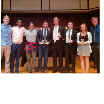The DePauw Debate Team at the 2015 "Forensic 500" Tournament hosted by the University of Indianapolis. Pictured (left to right): Matt Peirce, Kelechi Ikwuakor, Daniel Schultz, Matt Piggins, Mickey Terlep, Liam Byrnes, Jessica Miller, Jack Williams.