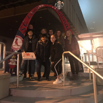DePauw Debaters downtown St. Louis before the Webster University 'Study Break' Tournament. Front row (left to right): Yong Heo, Yuki Harata, Kristina Mikhailova; Back Row: Lucas Taylor, Nina Stular, Alex Spencer, Brenna Milligan, Alayna Trier (2018).