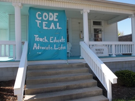 A freshly painted front porch to support Code TEAL