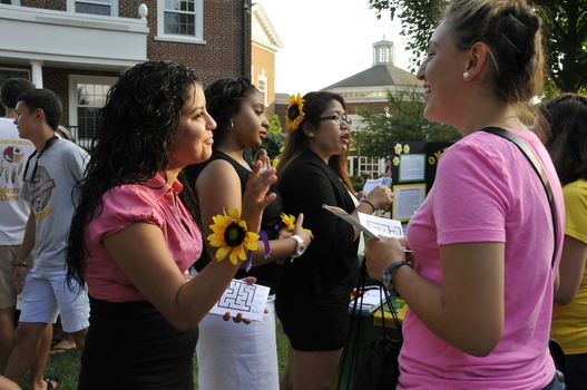 Students promoting a cause at a formal event