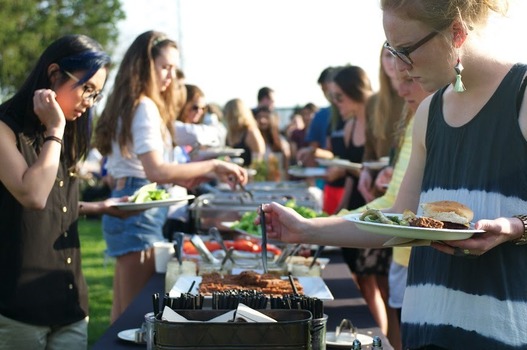 Students serving themselves at a catered meal