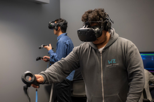 Two students using VR equipment in the Tenzer Visualization lab