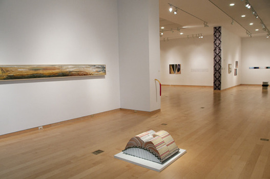 Peeler gallery with exhibit art positioned on the floor