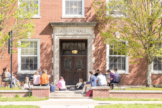 Students gathered for an outside class in front of Abury Hall