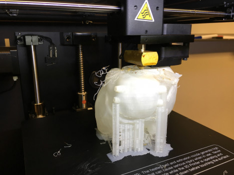 ITAP interns utilize technology like the Tenzer Center's 3D printers to contribute to campus projects and research.