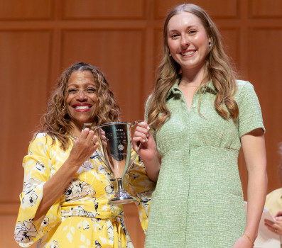 President Dr. Lori White gifts Walker Cup to Ashley Long