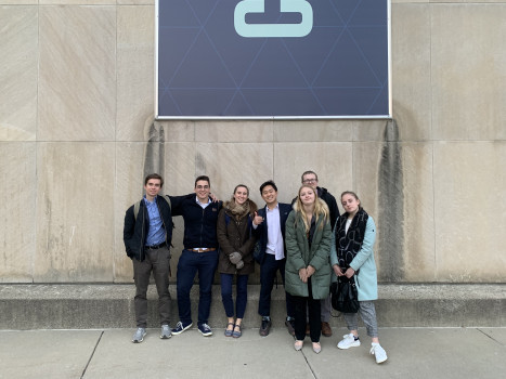 The award winning DePauw Debate Team celebrates outside Clowes Memorial Hall at Butler University.  Pictured (Left to Right): Matt Hatch, Damir Pupovic, Sage Klinger, Yong Heo. Alex Spencer, Alayna Trier, Kristina Mikhailova.