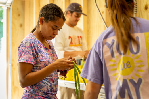 Student working at the Campus Farm