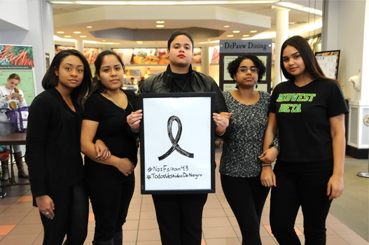 (left to right) Students Amanda Volel, Natalie Yaipan, Greisy Genao, Penelope Ramirez, and Kimberly Mendez standing in solidarity with Ayotzinapa for Compton's "Justice Thursdays".