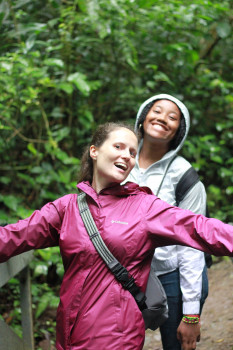 Two students crossing a bridge in Costa Rica
