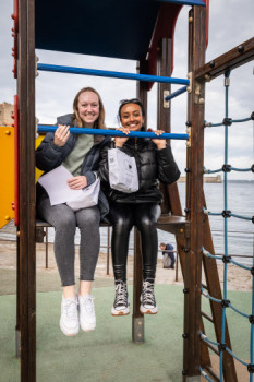 Two smiling DePauw students during an international experience.