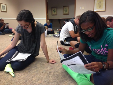 FYRA Yesenia Silva ('17) and CRA Ariel Cheatham ('16) participating in a reflection activity during SLS Institute