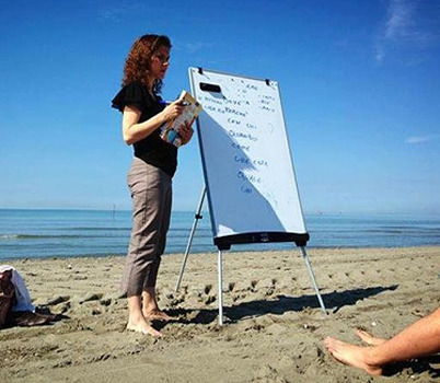 Professor Seaman teaching a lesson on the beach