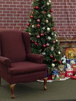Santa's chair and Christmas Tree at the holiday party