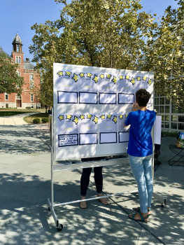 Creating posters in celebration of the 150th anniversary of women being admitted to DePauw