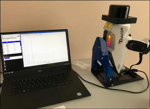 Handheld XRF unit for analyzing chemical compositions.
