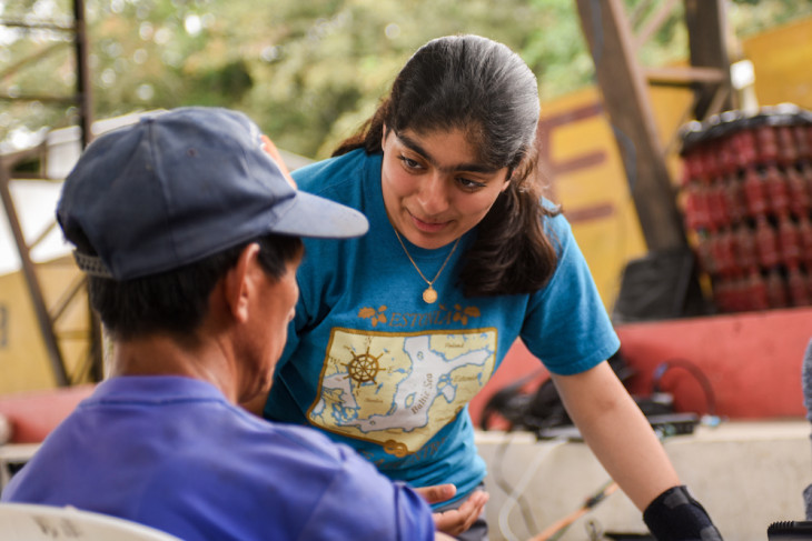 A student meets with a community member during the 2019-2020 Timmy Global Health trip. 