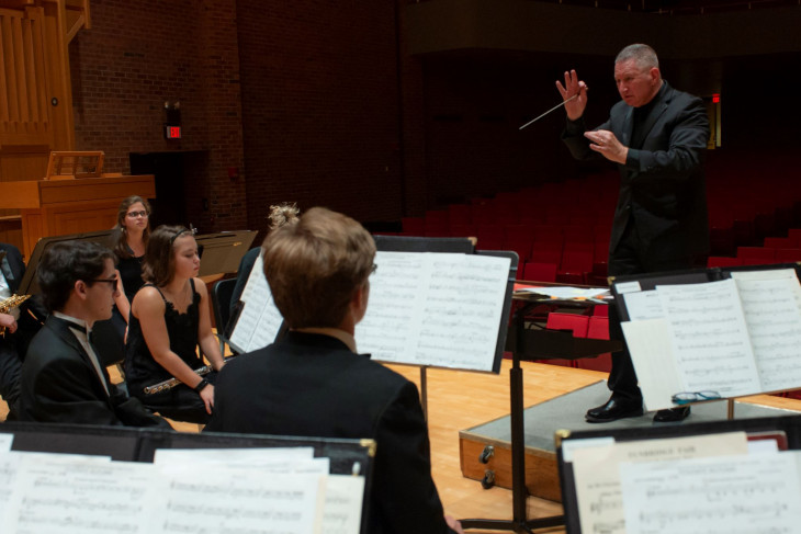 Conductor Craig Pare directs students in University Band