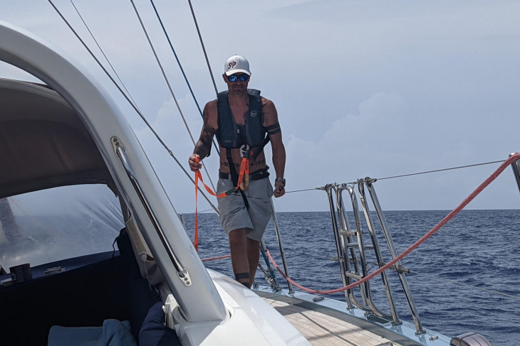 Dan Stotesbery walks along his boat