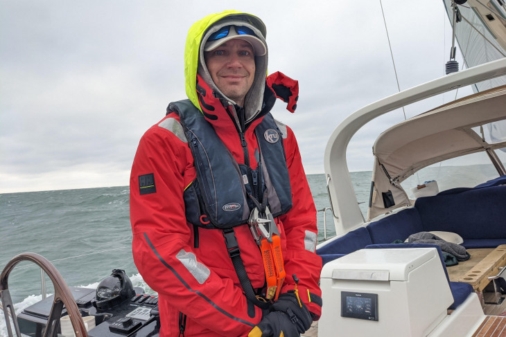 Dan Stotesbery wears rain gear on his boat