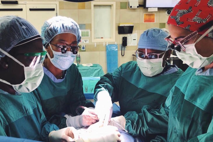 Shannon Fayson and other doctors perform surgery.