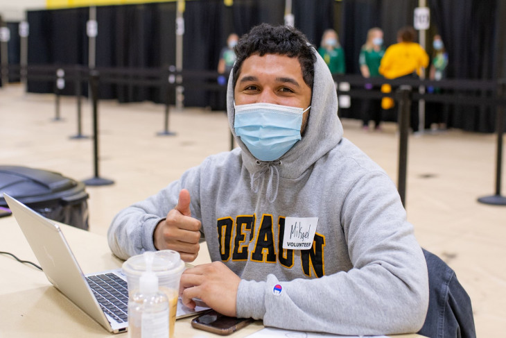 Student registers for his vaccine