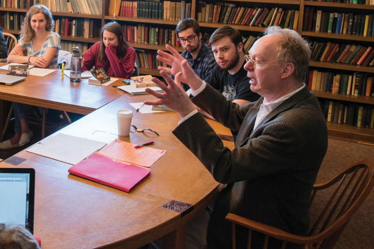 Wayne Glausser teaching in a classroom