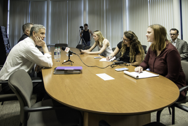 Arne Duncan at news conference with students