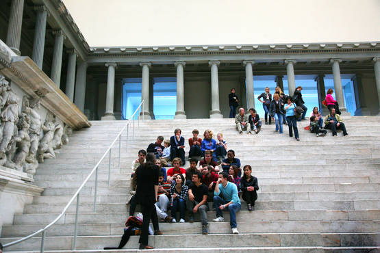 Students gathered on steps of a museum in Berlin