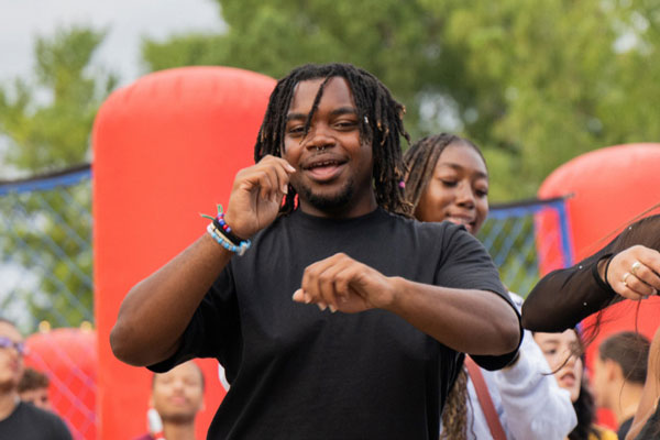 dancing students in the street