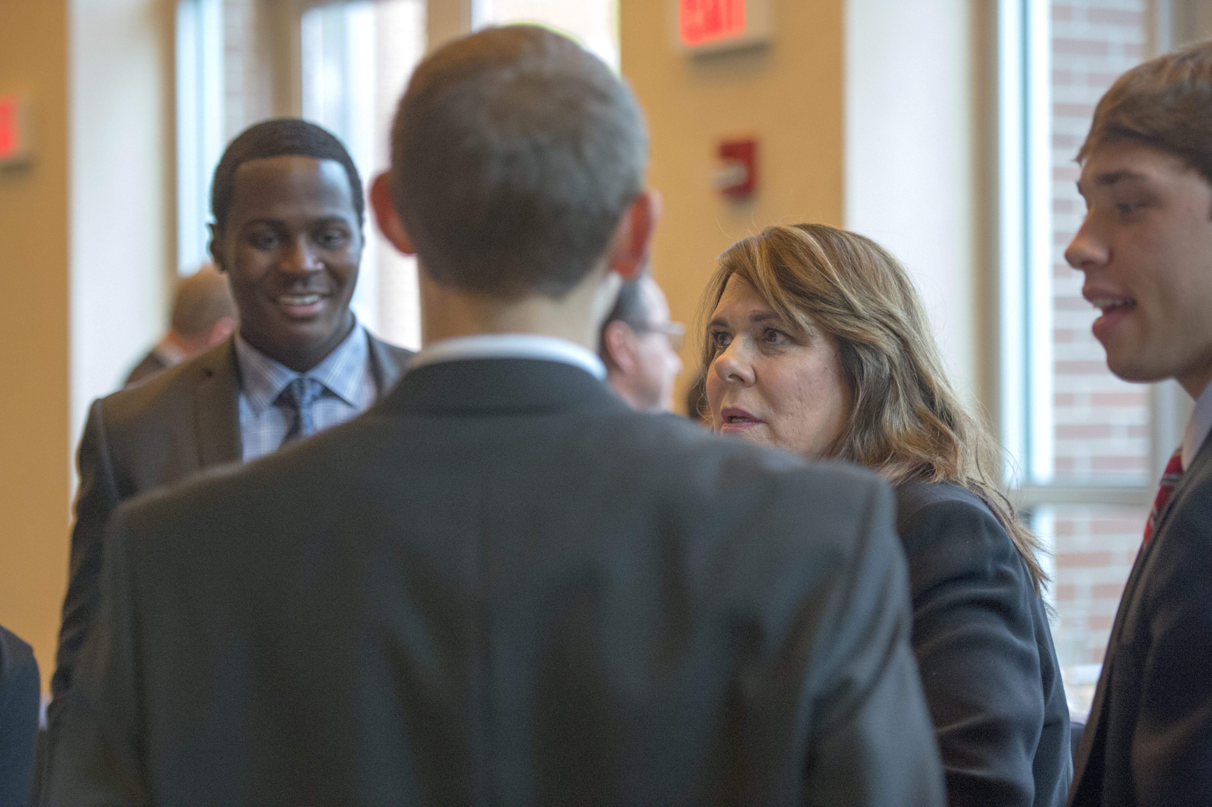 Candy Crowley talking with students