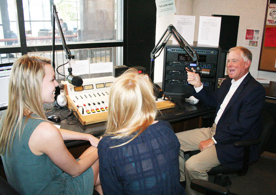 Dan Quayle talking with students in the WGRE radio booth