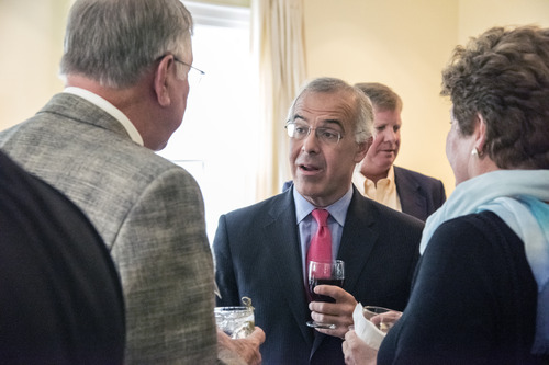 David Brooks talking with faculty