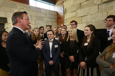 David Cameron talking with students