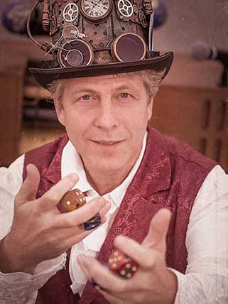David Cutler Smiling man holding dice