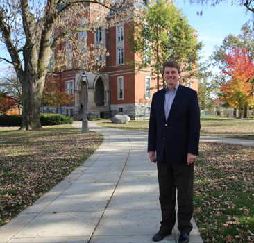 Douglas Hallward-Driemeier in front of East College