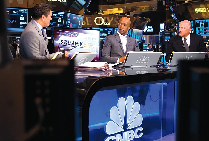 John Fortt with colleagues on the set of CNBC news show