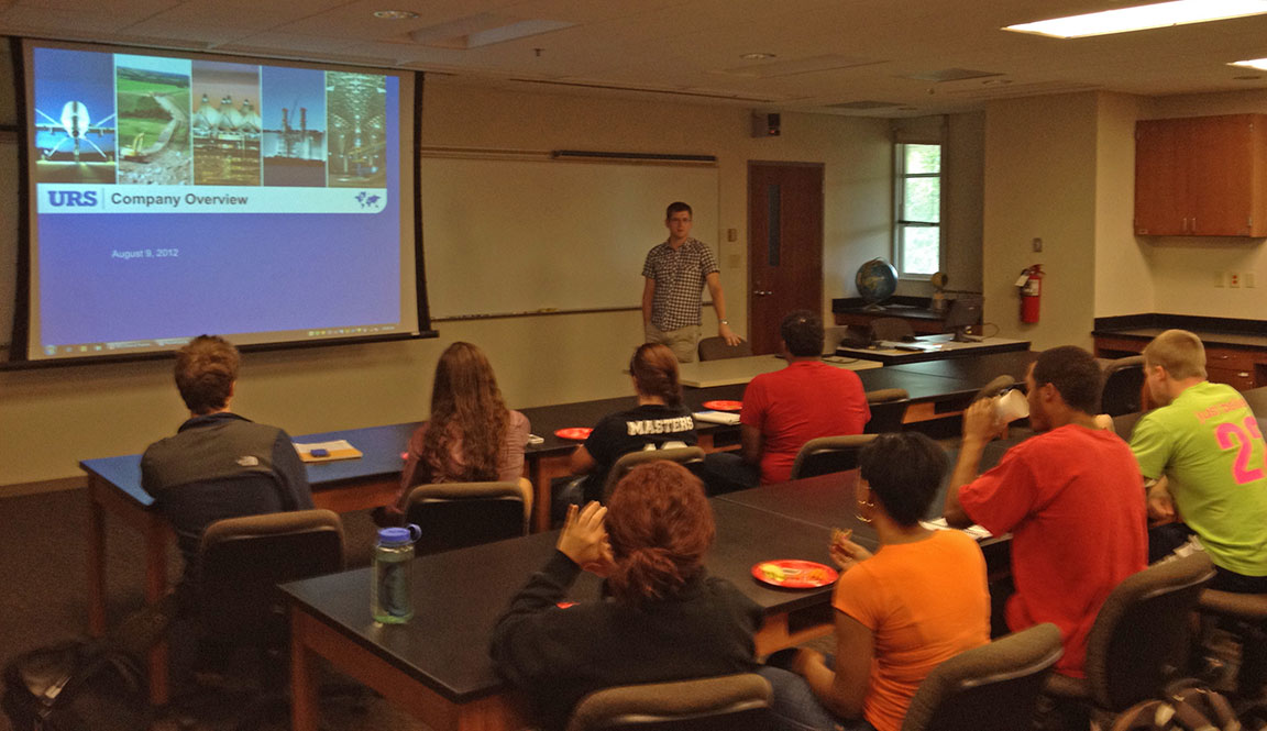 Aaron Hackman discussing his work as an environmental geologist