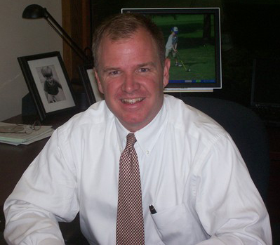 J. Michael Locke sitting in his office