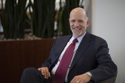 Jeffrey Harmening sitting in a chair