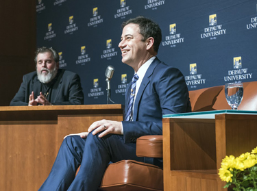 Jimmy Kimmel smiling while on stage