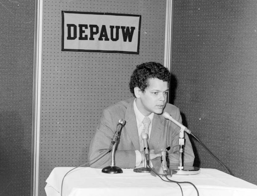 Julian Bond speaking into microphones at DePauw circa 1968