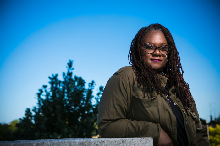 Deborah D. Douglas with clear sky backdrop